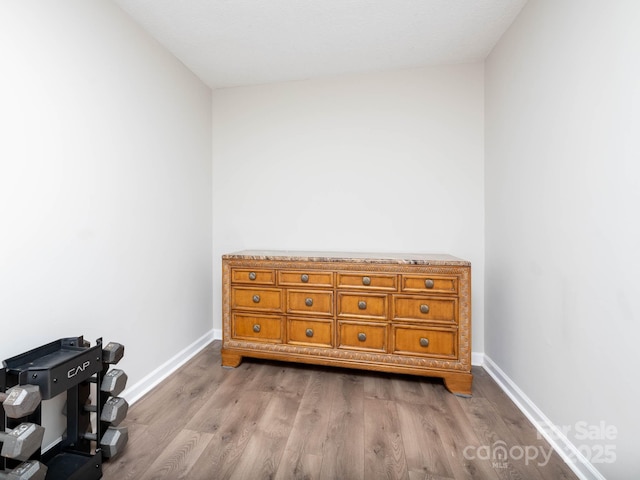 327 Downing St, Troutman, NC 28166 - bedroom featuring light wood finished floors and baseboards