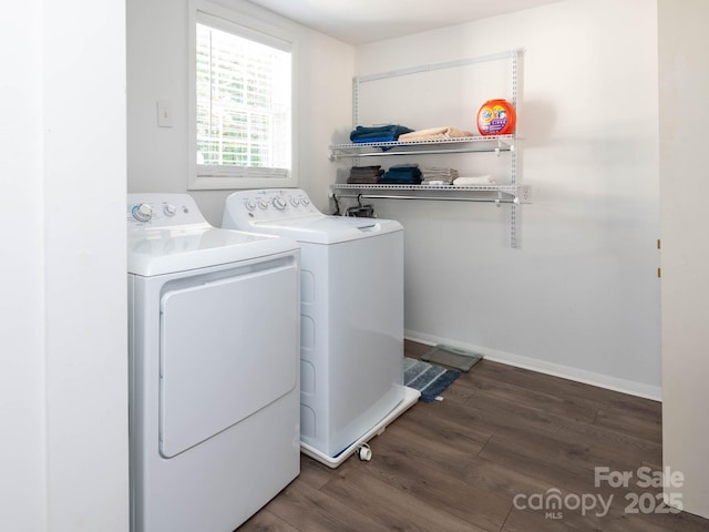 327 Downing St, Troutman, NC 28166 - washroom featuring washer and dryer and wood finished floors