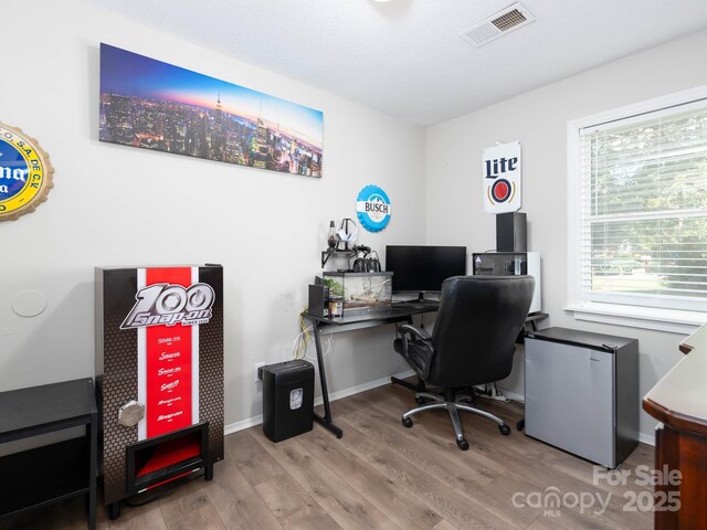 327 Downing St, Troutman, NC 28166 - office area featuring wood finished floors