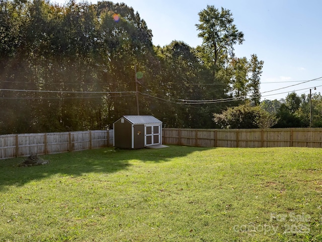327 Downing St, Troutman, NC 28166 - fenced backyard featuring a shed
