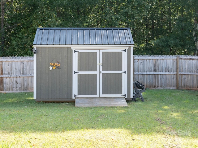 327 Downing St, Troutman, NC 28166 - view of shed with a fenced backyard