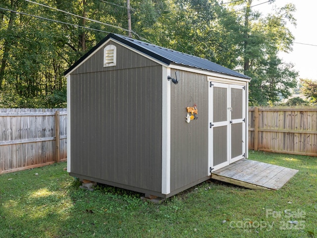 327 Downing St, Troutman, NC 28166 - view of shed with a fenced backyard