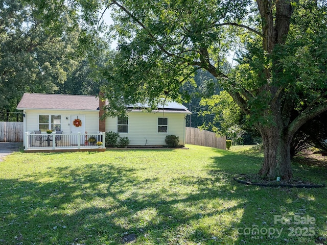327 Downing St, Troutman, NC 28166 - back of house featuring a wooden deck
