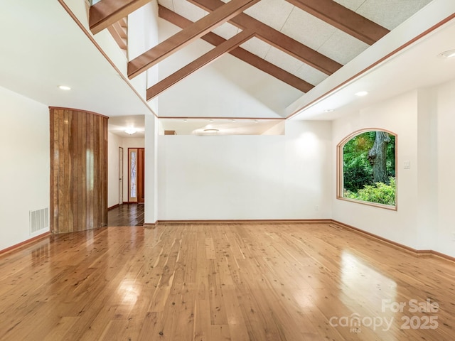 3310 Windbluff Dr, Charlotte, NC 28277 - empty room with beamed ceiling, hardwood / wood-style flooring, recessed lighting, and high vaulted ceiling