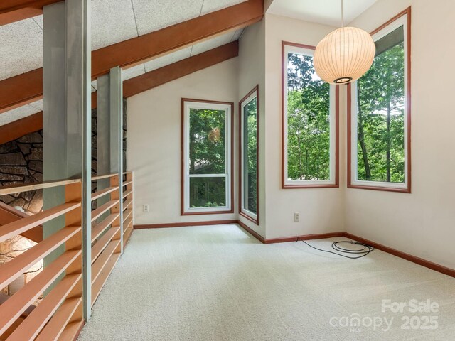3310 Windbluff Dr, Charlotte, NC 28277 - carpeted spare room featuring baseboards and vaulted ceiling