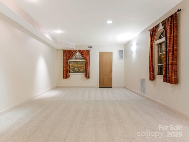 3310 Windbluff Dr, Charlotte, NC 28277 - spare room featuring carpet and recessed lighting