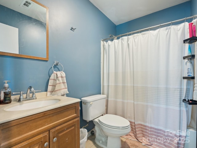 5701 Silver Eagle Dr, Charlotte, NC 28214 - full bath featuring vanity, shower / tub combo, and tile patterned floors