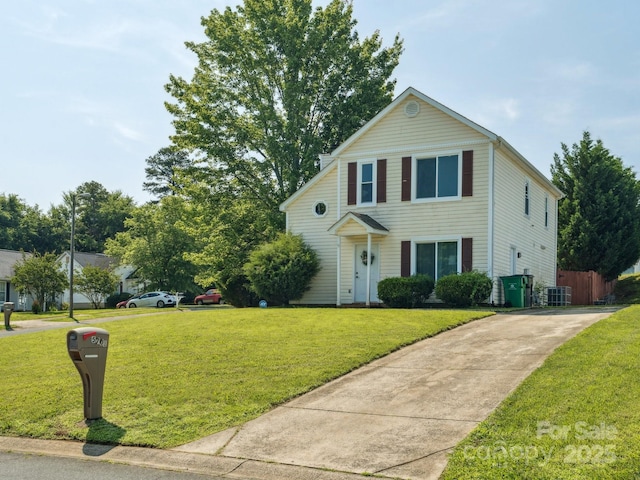 5701 Silver Eagle Dr, Charlotte, NC 28214 - traditional-style house featuring a front yard and concrete driveway