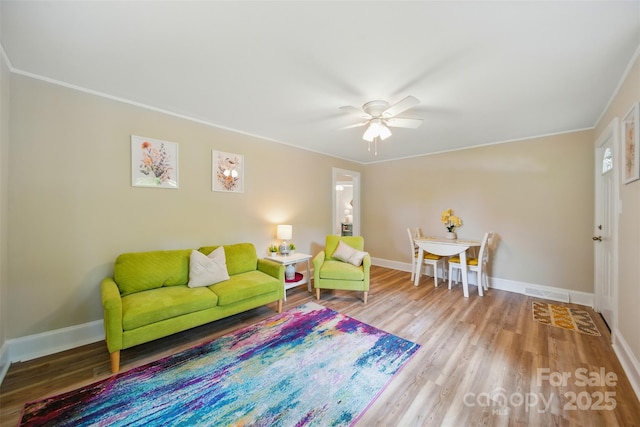 407 Cummings St, Rock Hill, SC 29730 - living area featuring wood finished floors, a ceiling fan, and crown molding
