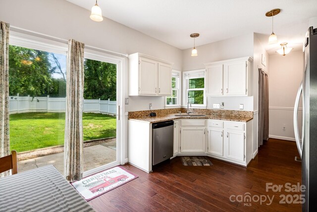 12 Eden Glen Rd, Black Mountain, NC 28711 - kitchen with appliances with stainless steel finishes, white cabinetry, dark wood-style floors, and light stone countertops