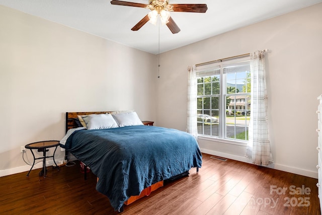 12 Eden Glen Rd, Black Mountain, NC 28711 - bedroom with wood finished floors and a ceiling fan