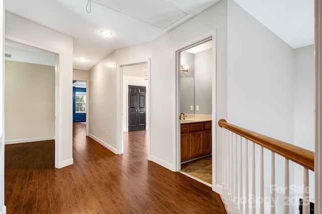 12 Eden Glen Rd, Black Mountain, NC 28711 - hall featuring dark wood-type flooring, attic access, recessed lighting, and an upstairs landing