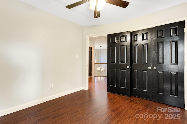 12 Eden Glen Rd, Black Mountain, NC 28711 - unfurnished bedroom with wood finished floors and ceiling fan
