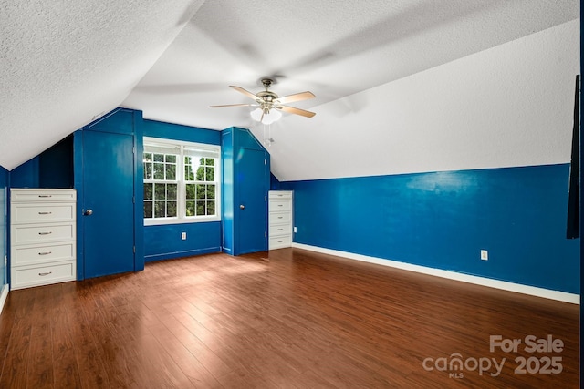 12 Eden Glen Rd, Black Mountain, NC 28711 - bonus room with a textured ceiling, ceiling fan, dark wood-style floors, and lofted ceiling