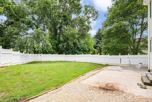 12 Eden Glen Rd, Black Mountain, NC 28711 - fenced backyard featuring a patio area and view of scattered trees