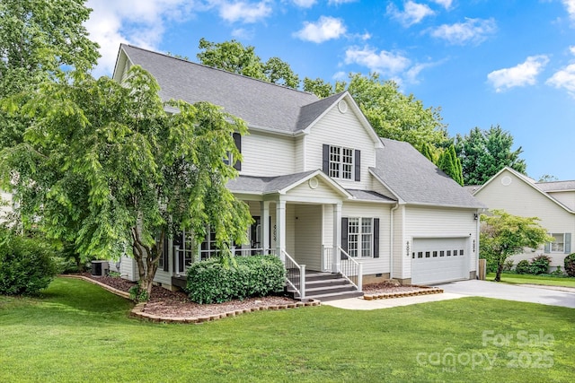 12 Eden Glen Rd, Black Mountain, NC 28711 - traditional-style home with covered porch, concrete driveway, an attached garage, a front lawn, and roof with shingles