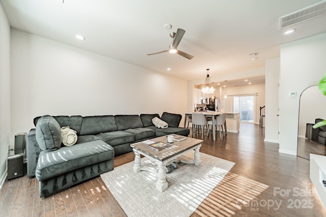 11546 Red Rust Ln, Charlotte, NC 28277 - living room featuring wood finished floors, a chandelier, ceiling fan, and recessed lighting