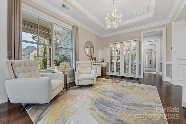 920 Terramore Dr, Waxhaw, NC 28173 - living area featuring a chandelier, wood finished floors, crown molding, and a tray ceiling