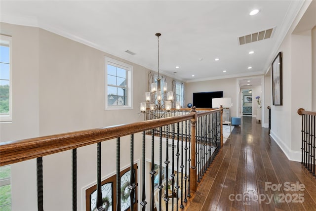 920 Terramore Dr, Waxhaw, NC 28173 - hall featuring a chandelier, an upstairs landing, dark wood-style floors, crown molding, and recessed lighting