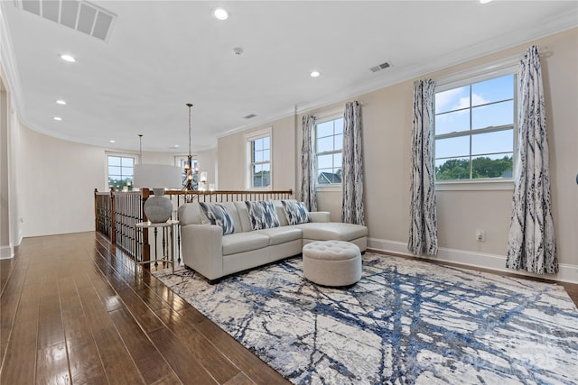 920 Terramore Dr, Waxhaw, NC 28173 - living room with dark wood finished floors, crown molding, recessed lighting, and a chandelier
