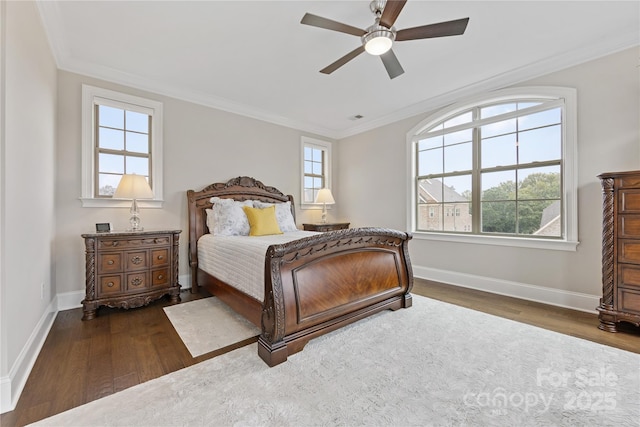 920 Terramore Dr, Waxhaw, NC 28173 - bedroom featuring wood finished floors, multiple windows, crown molding, and a ceiling fan
