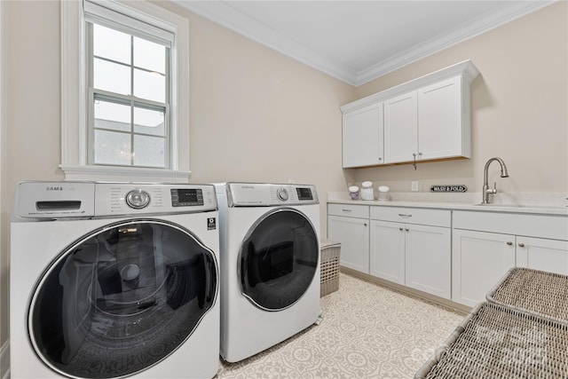 920 Terramore Dr, Waxhaw, NC 28173 - laundry area with separate washer and dryer, cabinet space, and crown molding