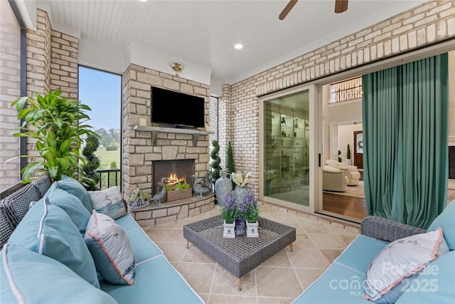 920 Terramore Dr, Waxhaw, NC 28173 - view of patio featuring ceiling fan and an outdoor living space with a fireplace