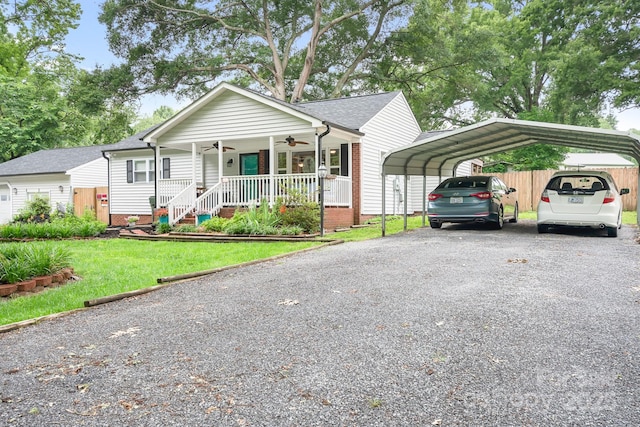 2279 Cedar Oak Cir, Gastonia, NC 28052 - view of front of property featuring a ceiling fan, a carport, a porch, and asphalt driveway
