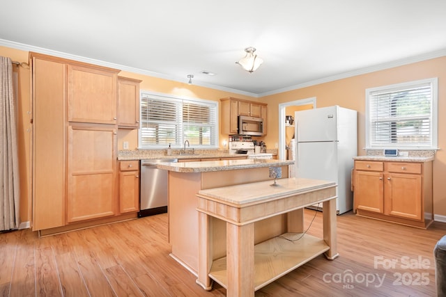 2279 Cedar Oak Cir, Gastonia, NC 28052 - kitchen with appliances with stainless steel finishes, light wood-type flooring, ornamental molding, and healthy amount of natural light