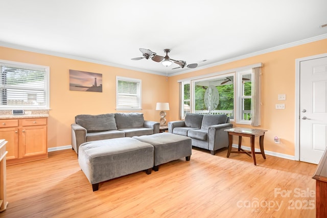 2279 Cedar Oak Cir, Gastonia, NC 28052 - living room with crown molding, light wood-style flooring, and a ceiling fan