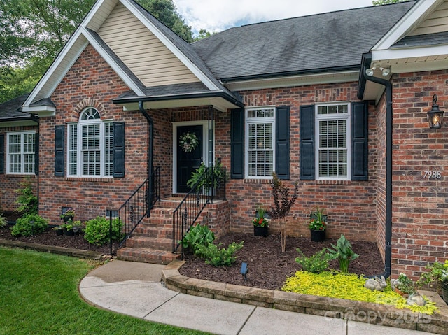 7988 Golf Course Dr N, Denver, NC 28037 - view of front facade featuring brick siding and roof with shingles