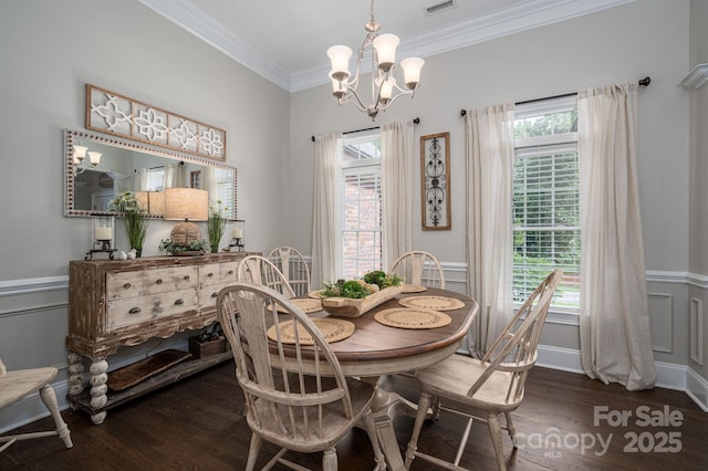 7988 Golf Course Dr N, Denver, NC 28037 - dining area featuring a chandelier, crown molding, healthy amount of natural light, dark wood finished floors, and a wainscoted wall