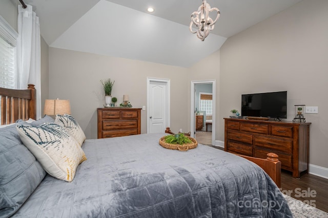 7988 Golf Course Dr N, Denver, NC 28037 - bedroom featuring vaulted ceiling, wood finished floors, and a chandelier