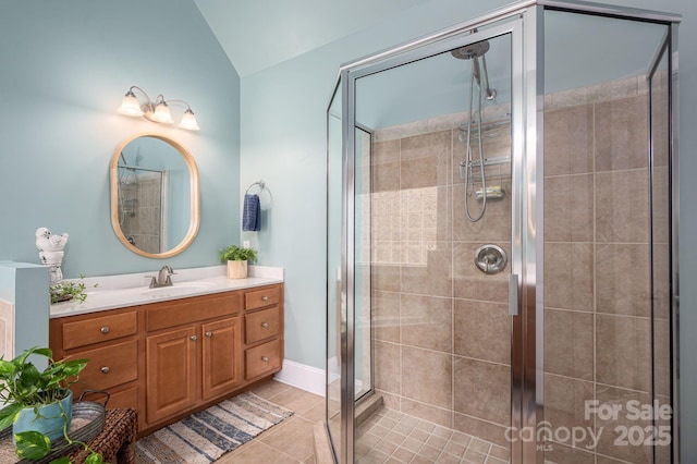 7988 Golf Course Dr N, Denver, NC 28037 - full bath with vanity, a stall shower, tile patterned floors, and lofted ceiling