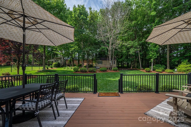 7988 Golf Course Dr N, Denver, NC 28037 - wooden terrace with outdoor dining area, a yard, and view of wooded area