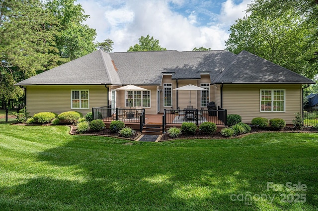 7988 Golf Course Dr N, Denver, NC 28037 - back of house with roof with shingles, a deck, and a lawn