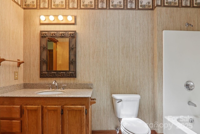58 Oak Ter, Arden, NC 28704 - bathroom with vanity, shower / tub combination, and wallpapered walls