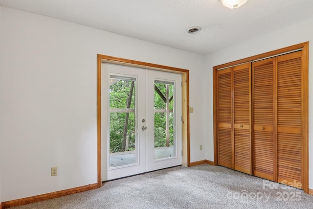 58 Oak Ter, Arden, NC 28704 - unfurnished bedroom featuring french doors, access to outside, carpet floors, and a closet
