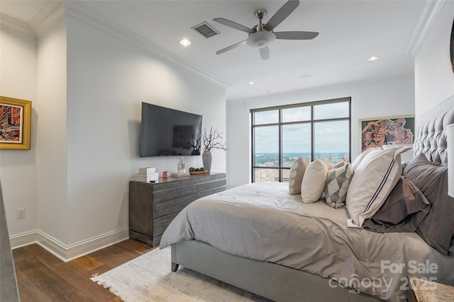 222 S Caldwell St # 2203, Charlotte, NC 28202 - bedroom with wood finished floors, crown molding, a ceiling fan, recessed lighting, and access to outside
