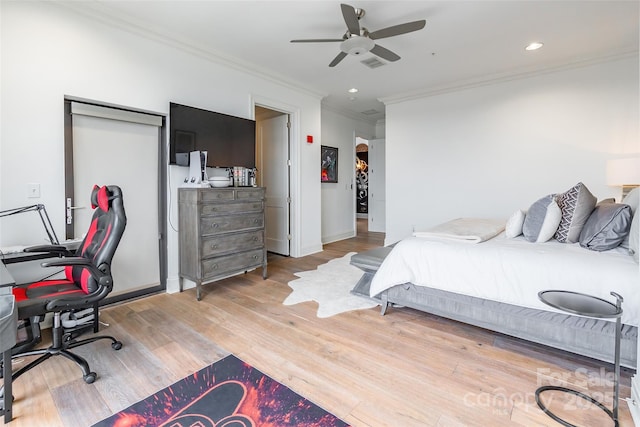 222 S Caldwell St # 2203, Charlotte, NC 28202 - bedroom featuring ornamental molding, light wood-style flooring, a desk, recessed lighting, and ceiling fan