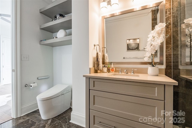 222 S Caldwell St # 2203, Charlotte, NC 28202 - bathroom with vanity and marble look tiles