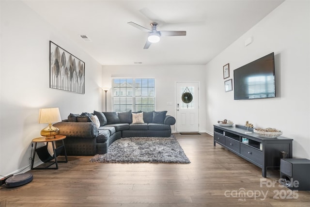 1343 Kent Downs Ave SW, Concord, NC 28027 - living area with ceiling fan and wood finished floors