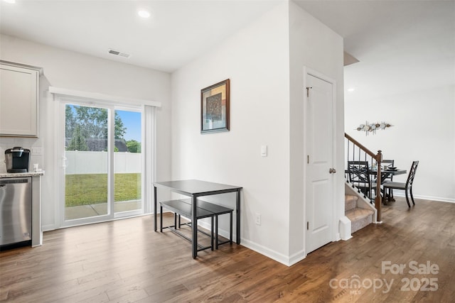 1343 Kent Downs Ave SW, Concord, NC 28027 - dining room with stairway, wood finished floors, and recessed lighting