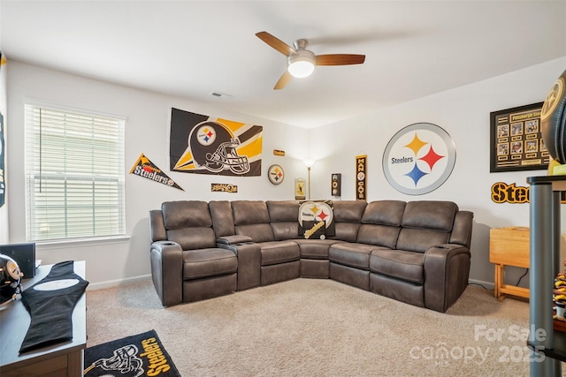1343 Kent Downs Ave SW, Concord, NC 28027 - carpeted living area with a ceiling fan and baseboards