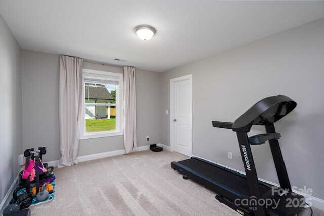 360 Sexton St, Kannapolis, NC 28081 - exercise area featuring carpet floors and baseboards