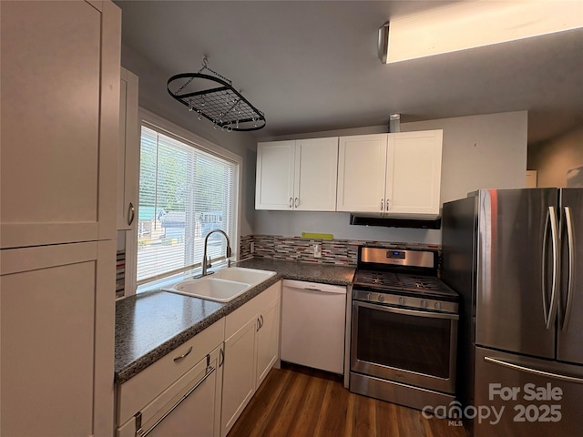 333 Mount View Ln Unit 266B, New London, NC 28127 - kitchen featuring stainless steel appliances, white cabinets, dark countertops, and dark wood-style floors