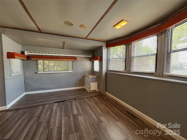 333 Mount View Ln Unit 266B, New London, NC 28127 - unfurnished room with baseboards and dark wood-style floors