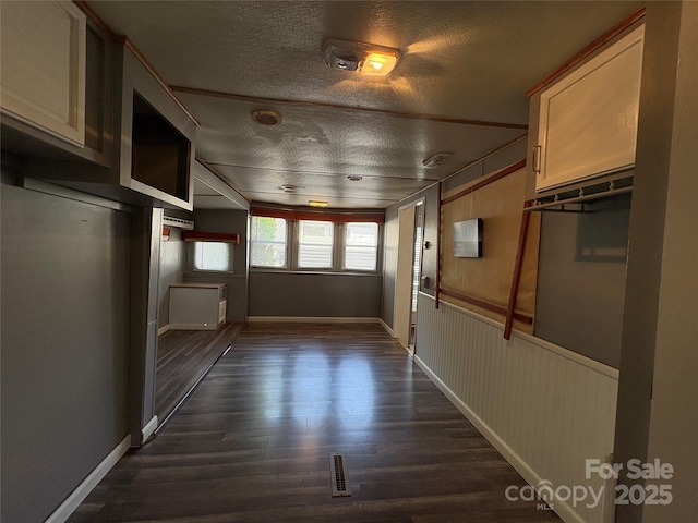 333 Mount View Ln Unit 266B, New London, NC 28127 - corridor with a textured ceiling and dark wood-style flooring