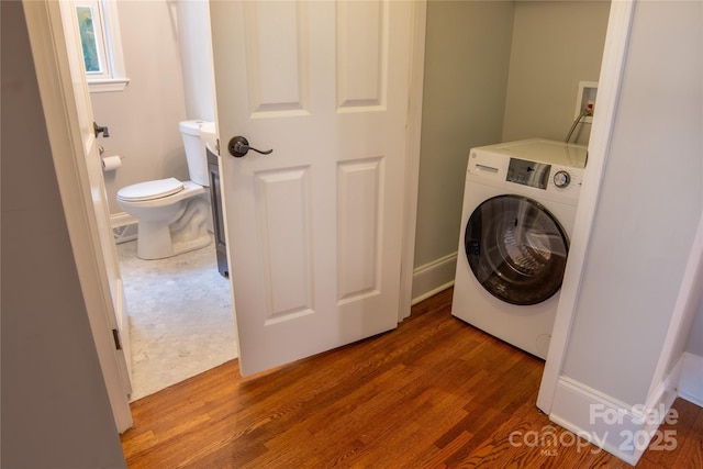 2115 Arnold Dr, Charlotte, NC 28205 - laundry area featuring washer / dryer and wood finished floors