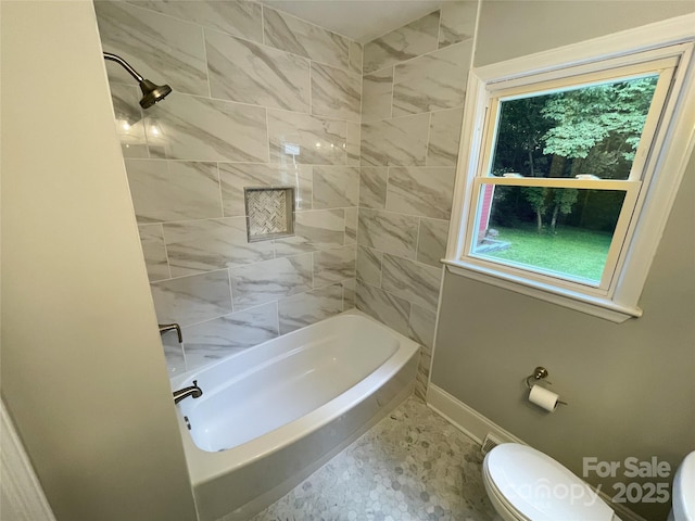 2115 Arnold Dr, Charlotte, NC 28205 - bathroom featuring healthy amount of natural light and bathing tub / shower combination
